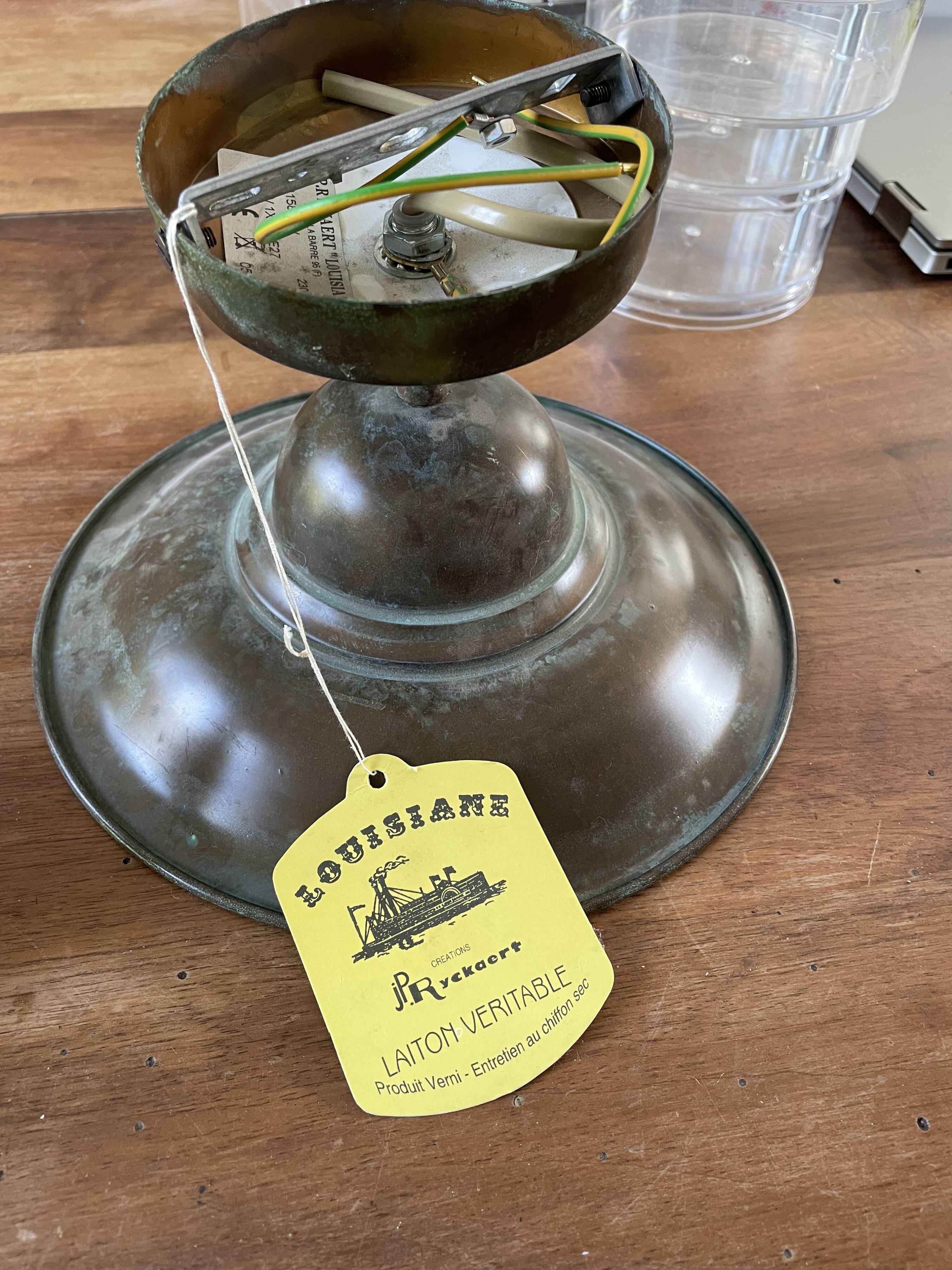 Pair of industrial brass wall lamps