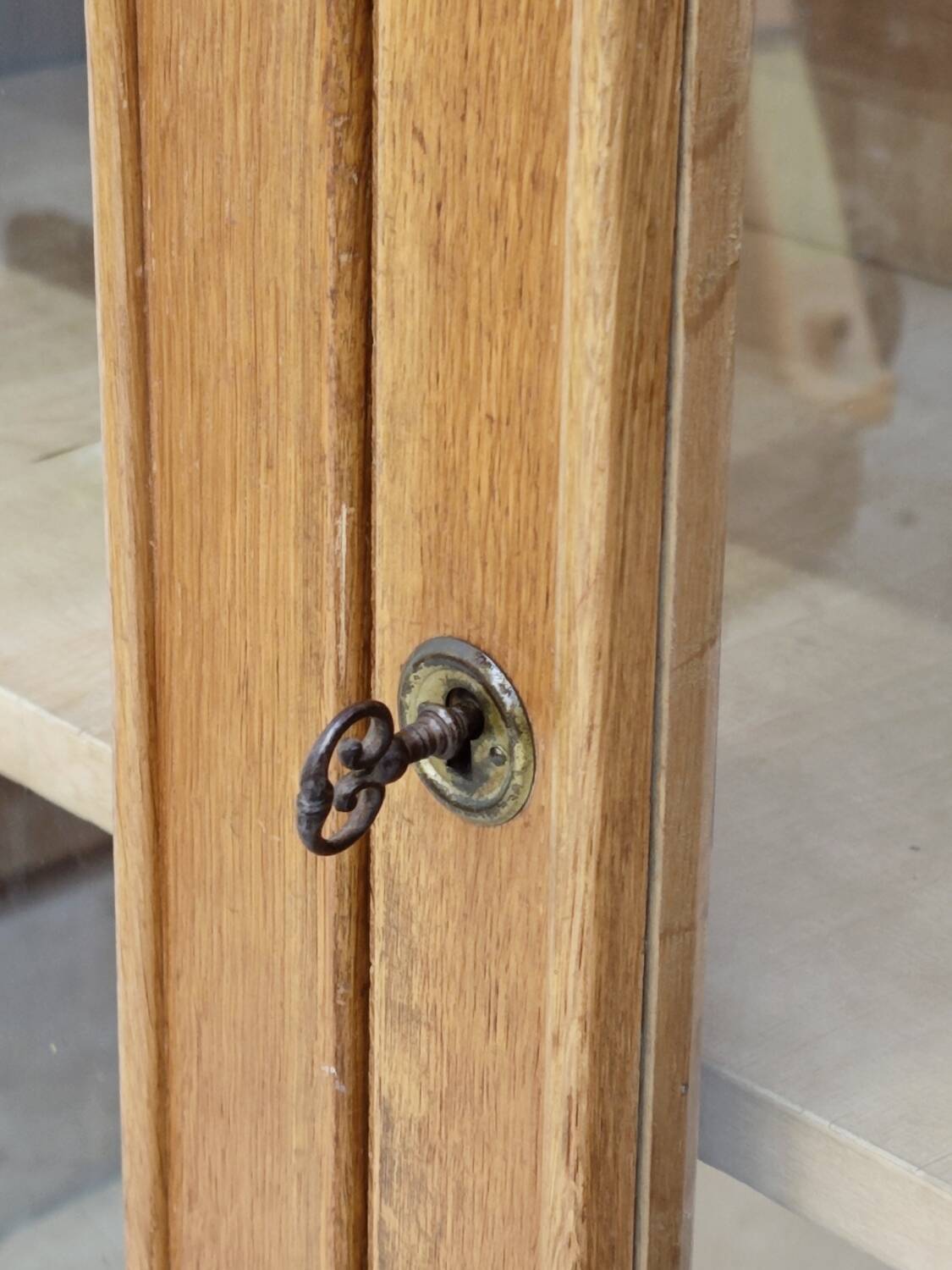Oak glass-fronted school cabinet 1960