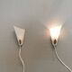 Two small Art Deco wall lights.