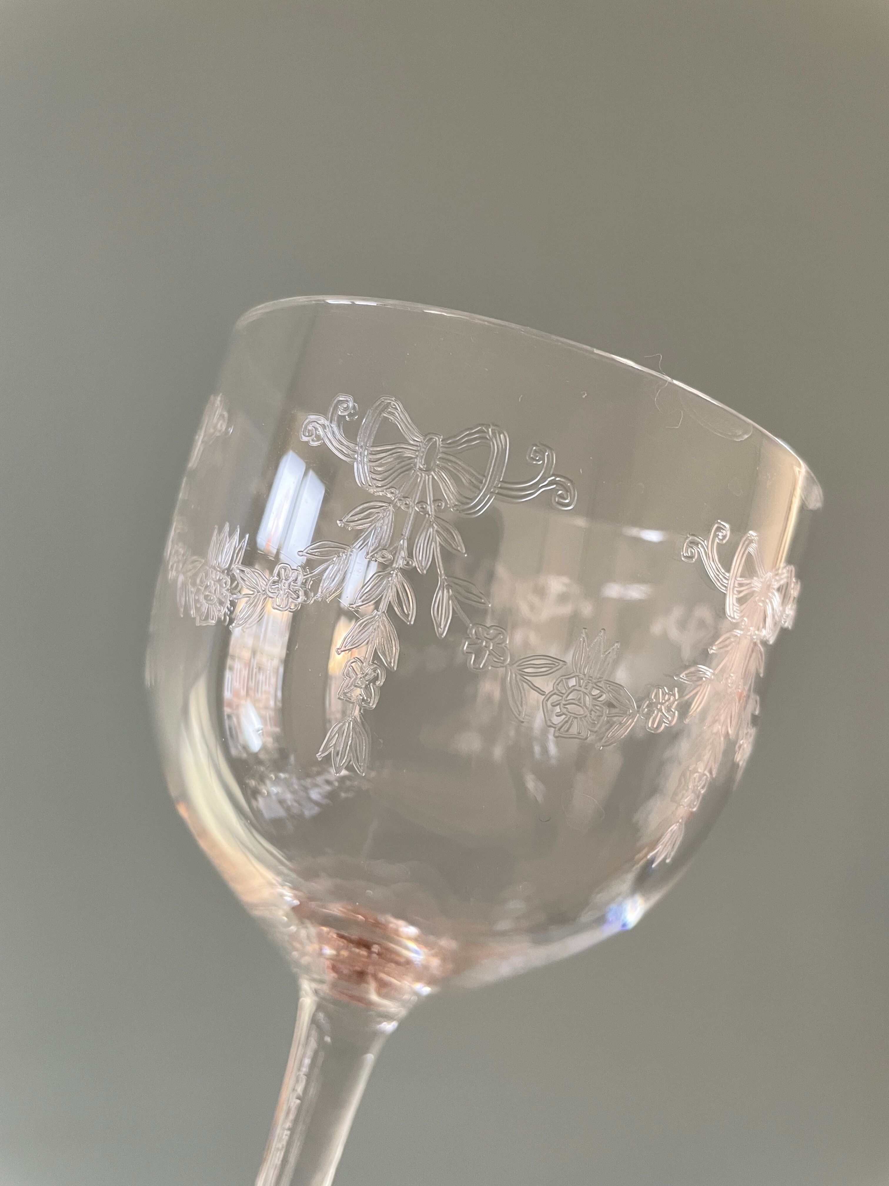Set of 4 antique chiseled crystal foot glasses