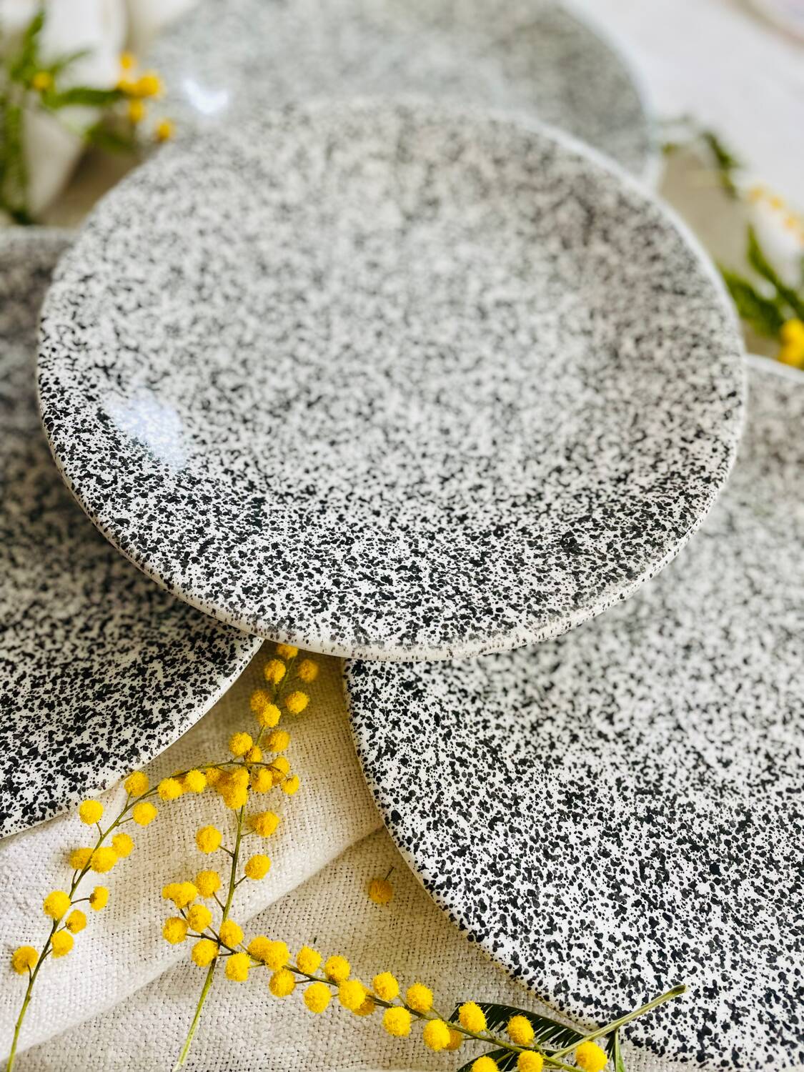 Set of 4 speckled black and white ceramic plates made in Italy