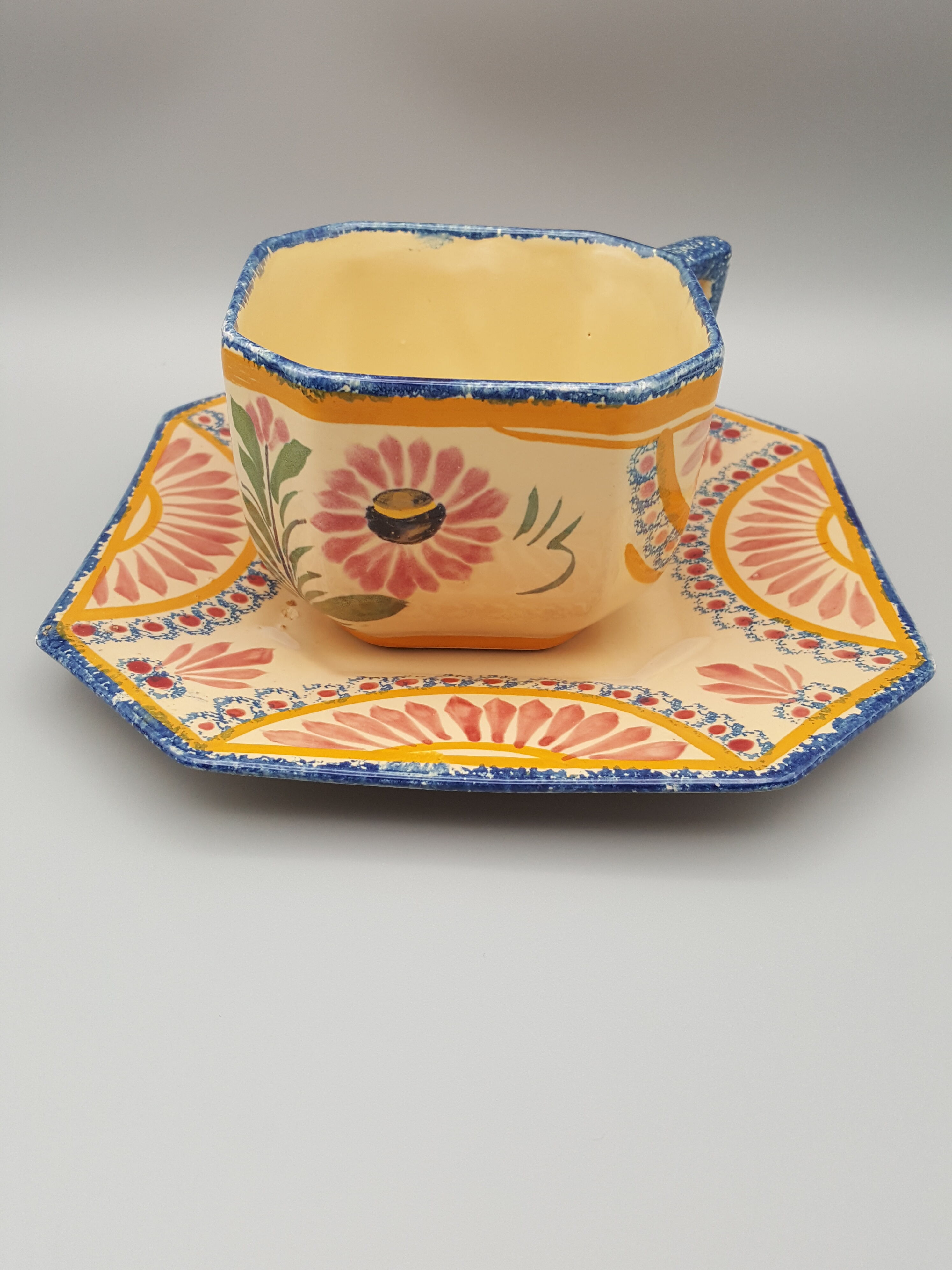 cups with octagonal saucers Henriot Quimper flower decoration leaves flowers