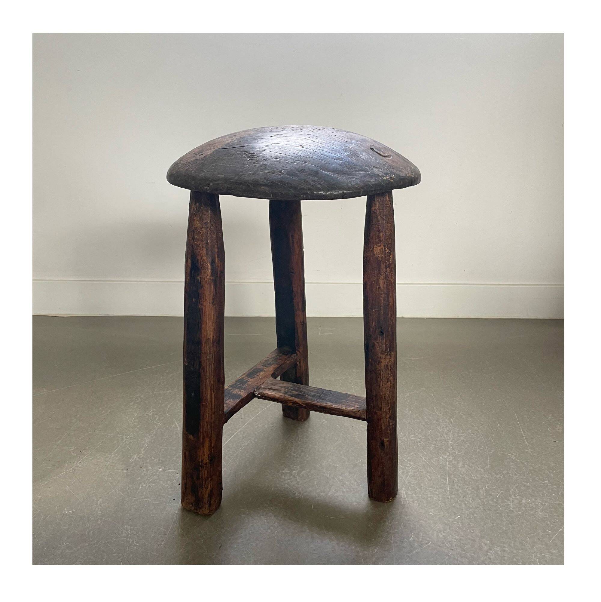 Antique tripod wooden stool, brutalist, wabi sabi style