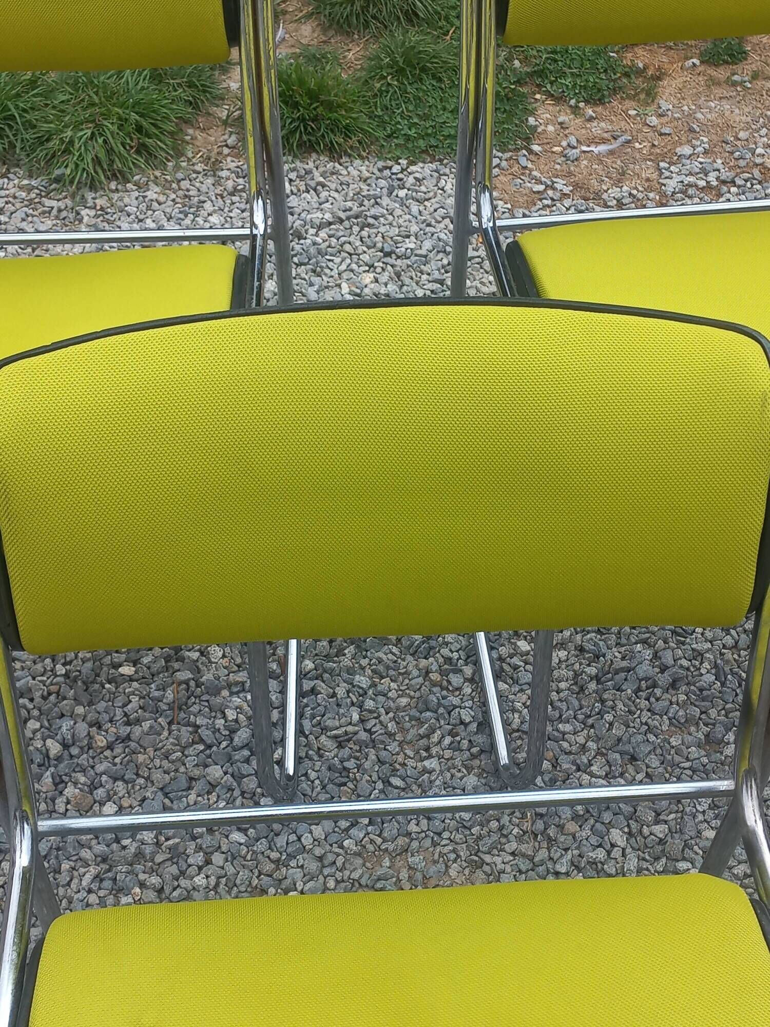Set of 6 designer chairs with wooden seats and backs, chrome legs.