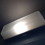 Rectangular porthole wall light in industrial/70s style frosted glass