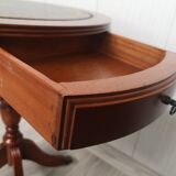 Mid - Century cupboard table with drawers and leather top.