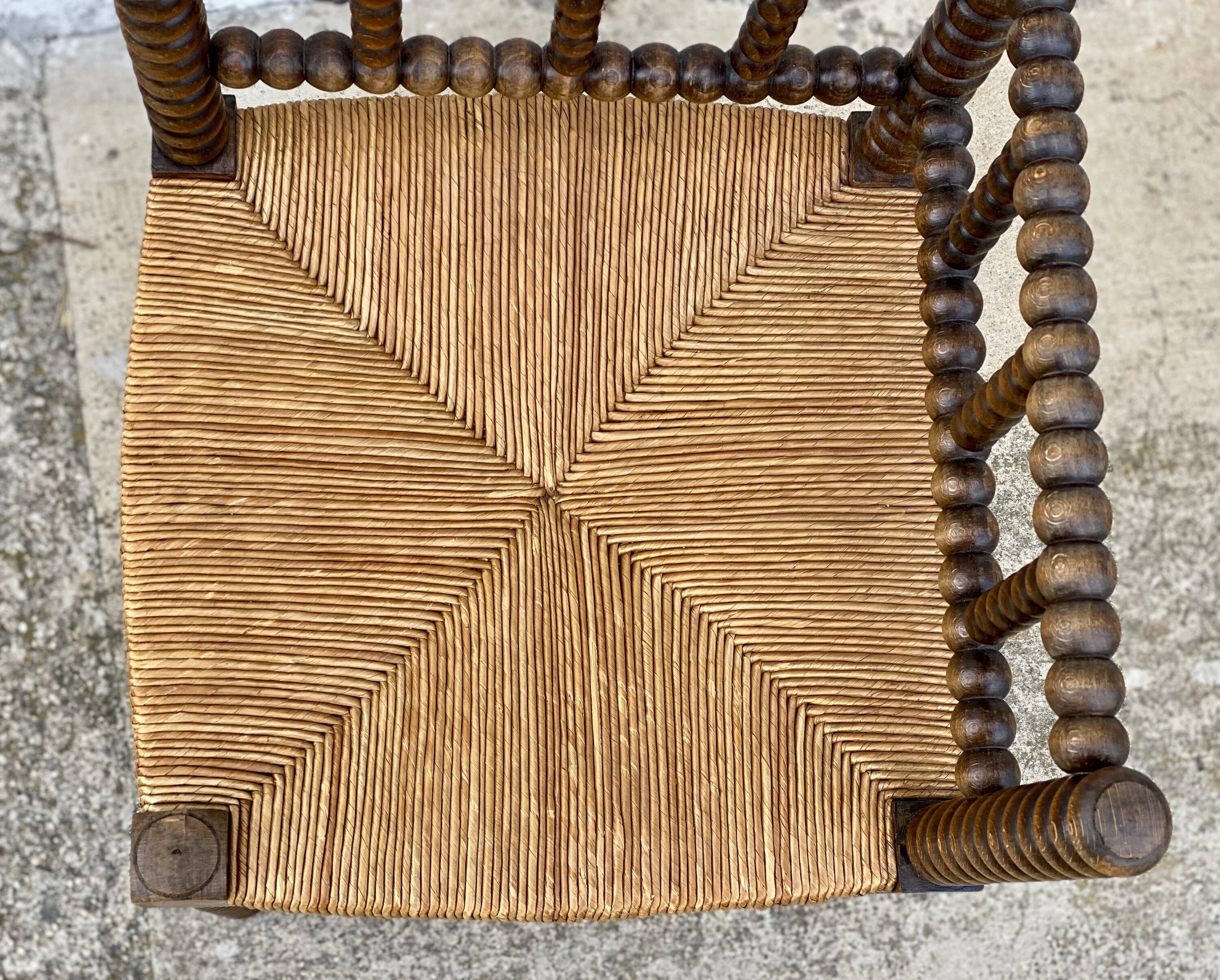 Art Deco turned wood straw corner armchair