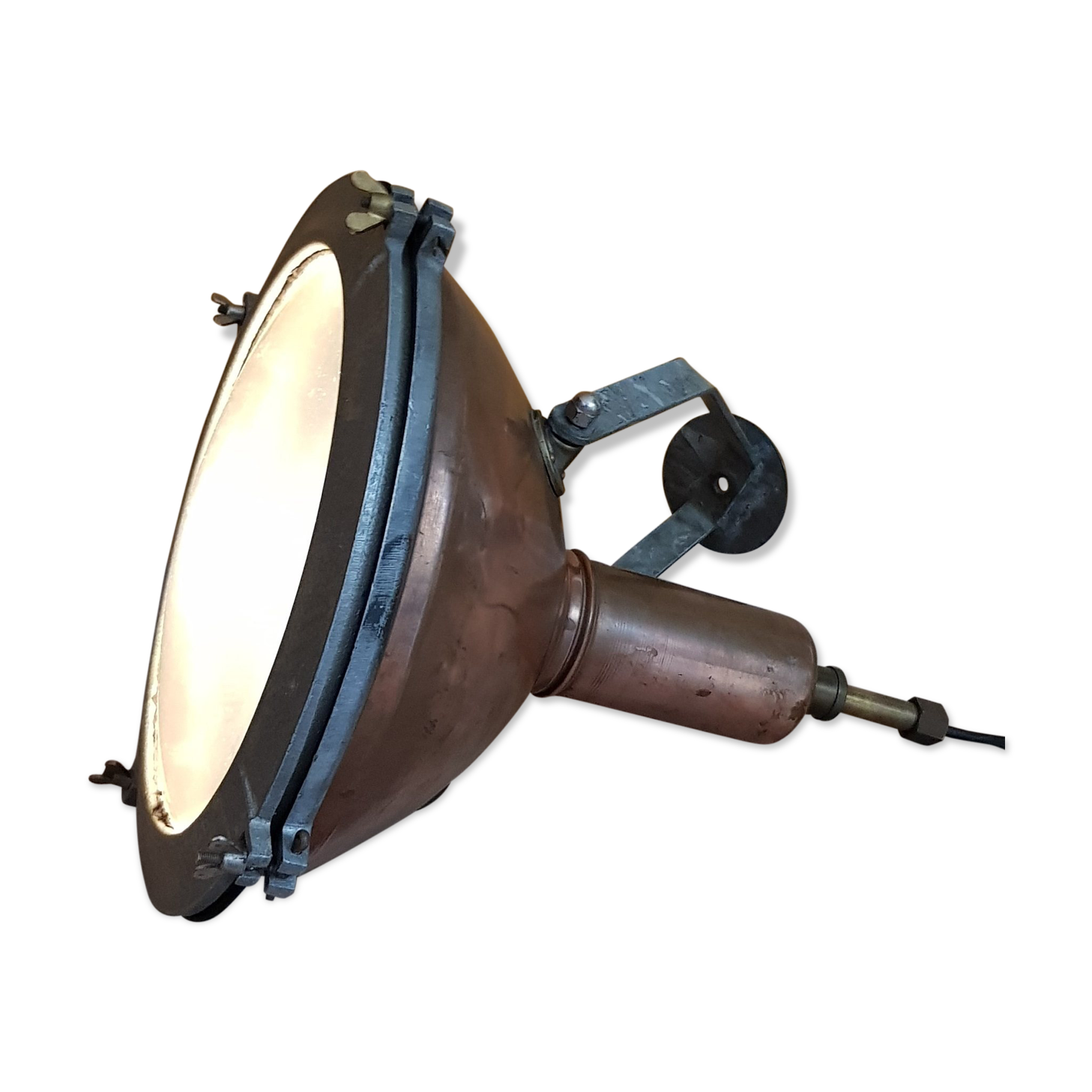Old brass boat headlight with Holophane interior glass