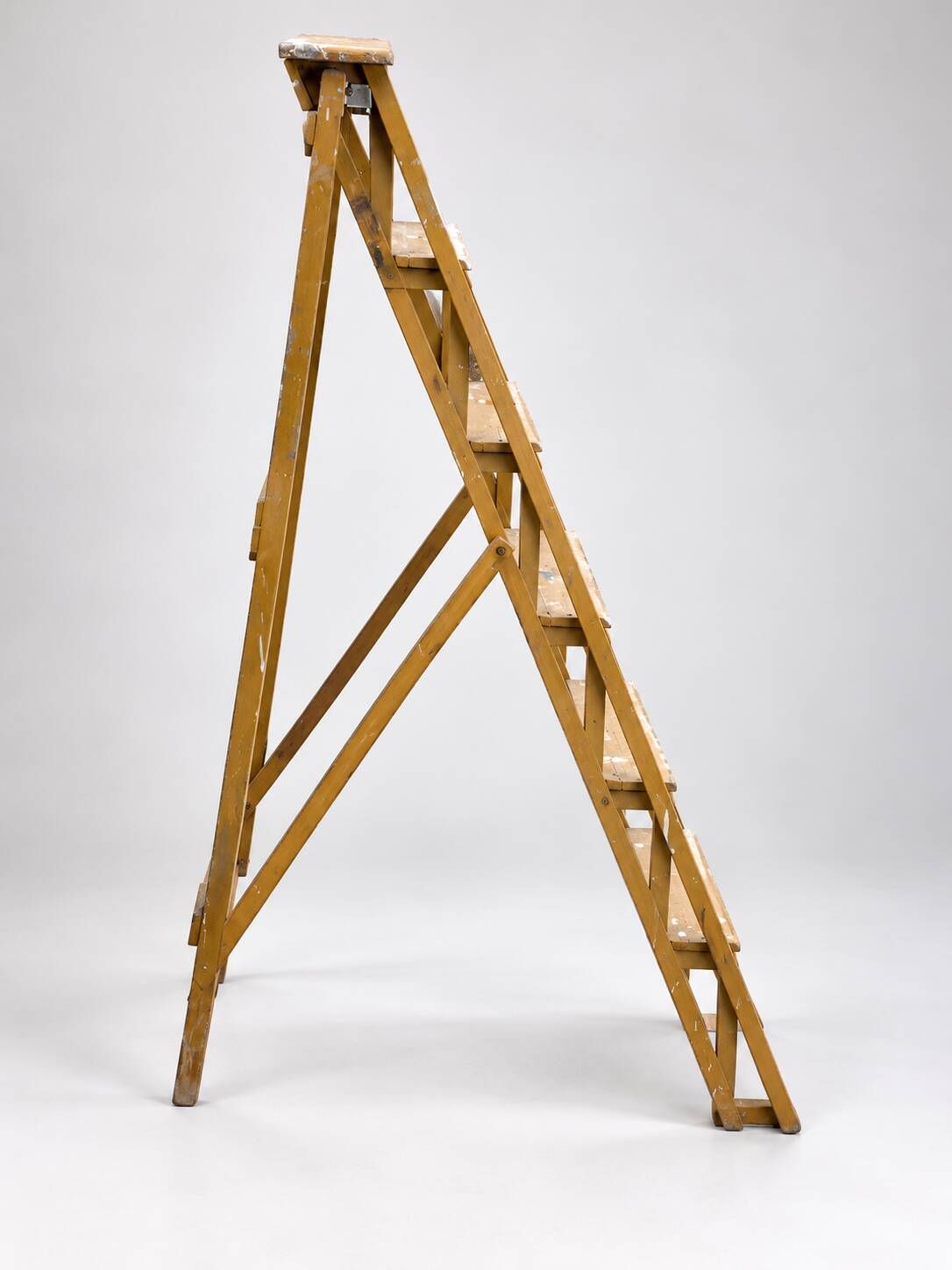 Vintage wooden painter's step ladder with a patina.