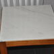 Pair of wooden and marble side tables