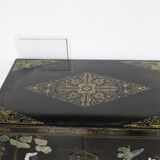 Black lacquered Chinese buffet with stone and ivory figures