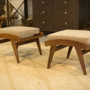 Scandinavian armchair and two 1960s ottomans.