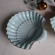 Shell-shaped porcelain dishes.