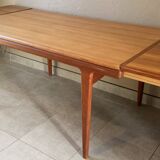 Table scandinave en teck par johannes andersen à rallonges papillon des années 60