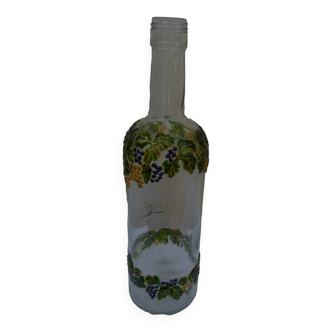 VINTAGE glass bottle with relief decoration painted with vine pattern