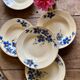 Set of 6 old-fashioned soup plates with blueberry decorations
