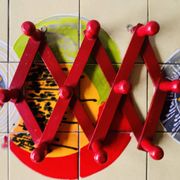 Vintage accordion coat rack in red painted wood