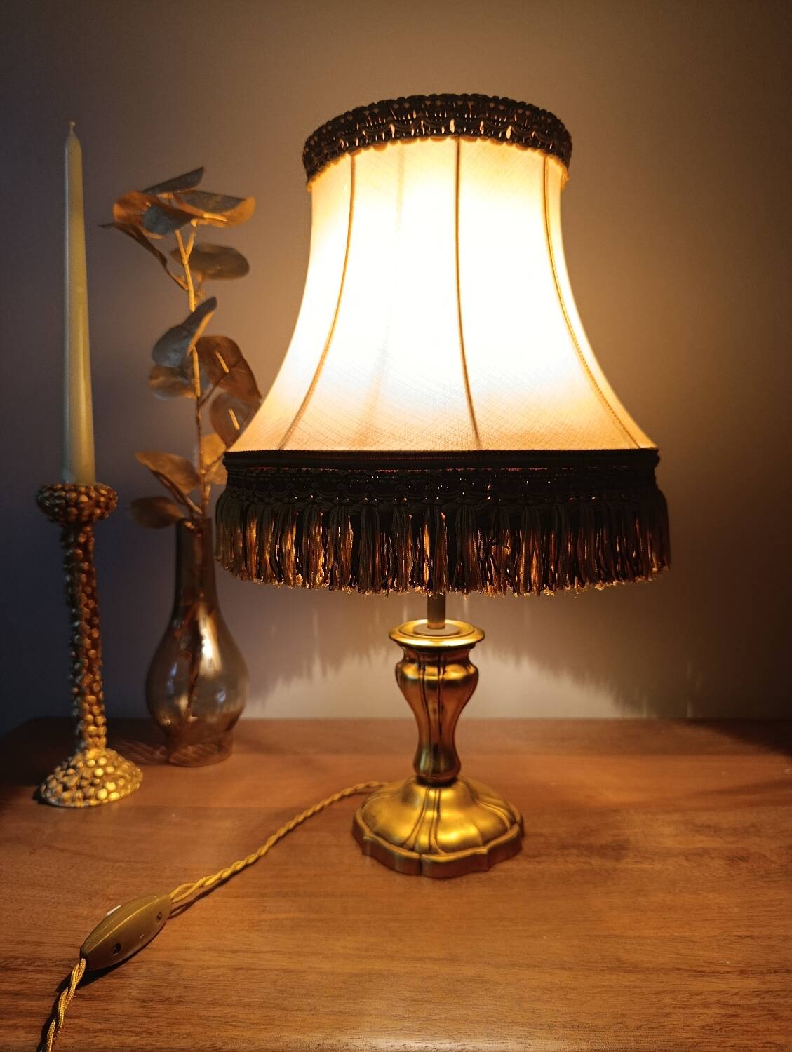 Chic retro lamp with a bronze pagoda fringe shade, 1950.