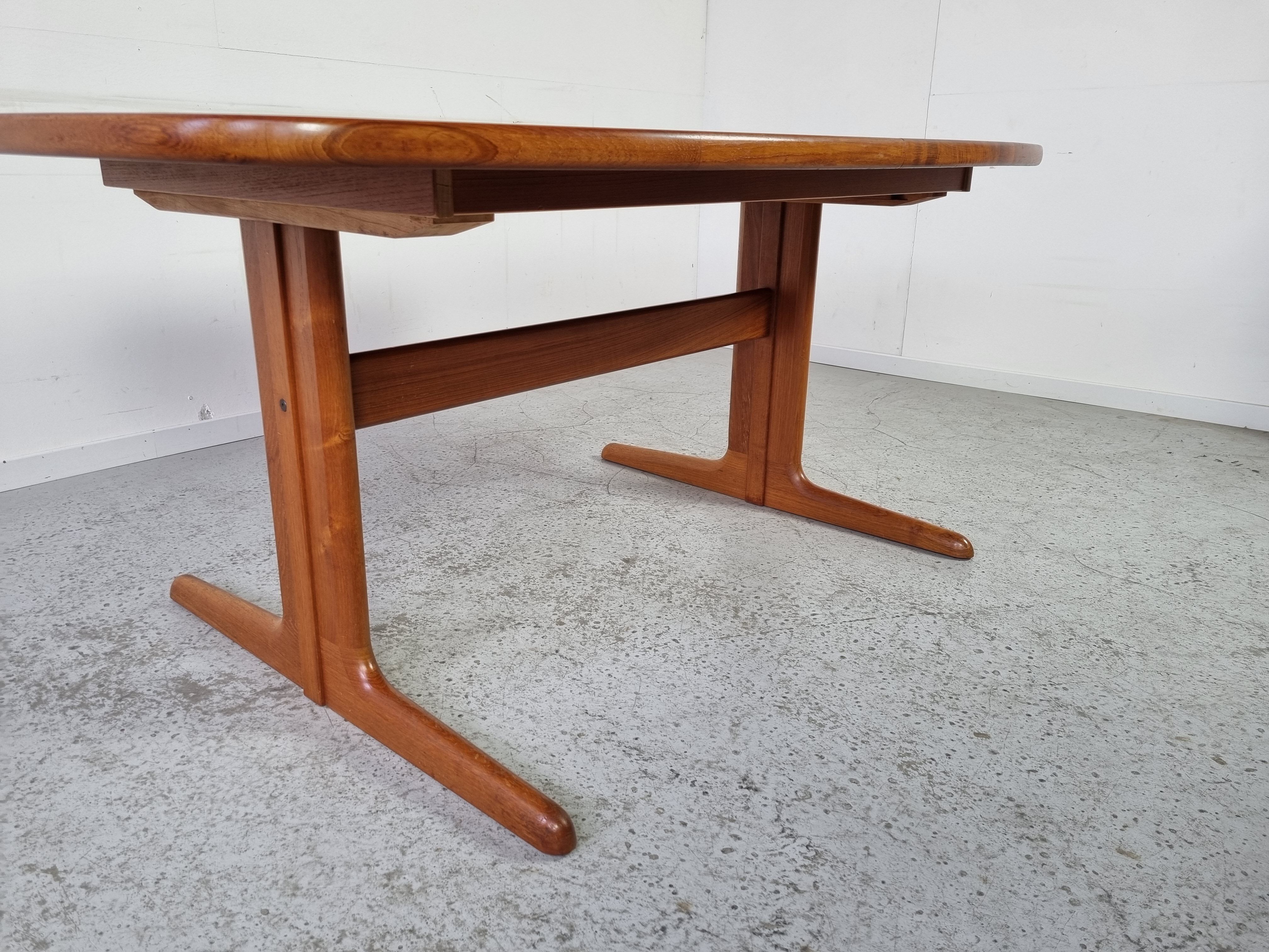 Extendable teak dining table from Dyrlund, Denmark 60s