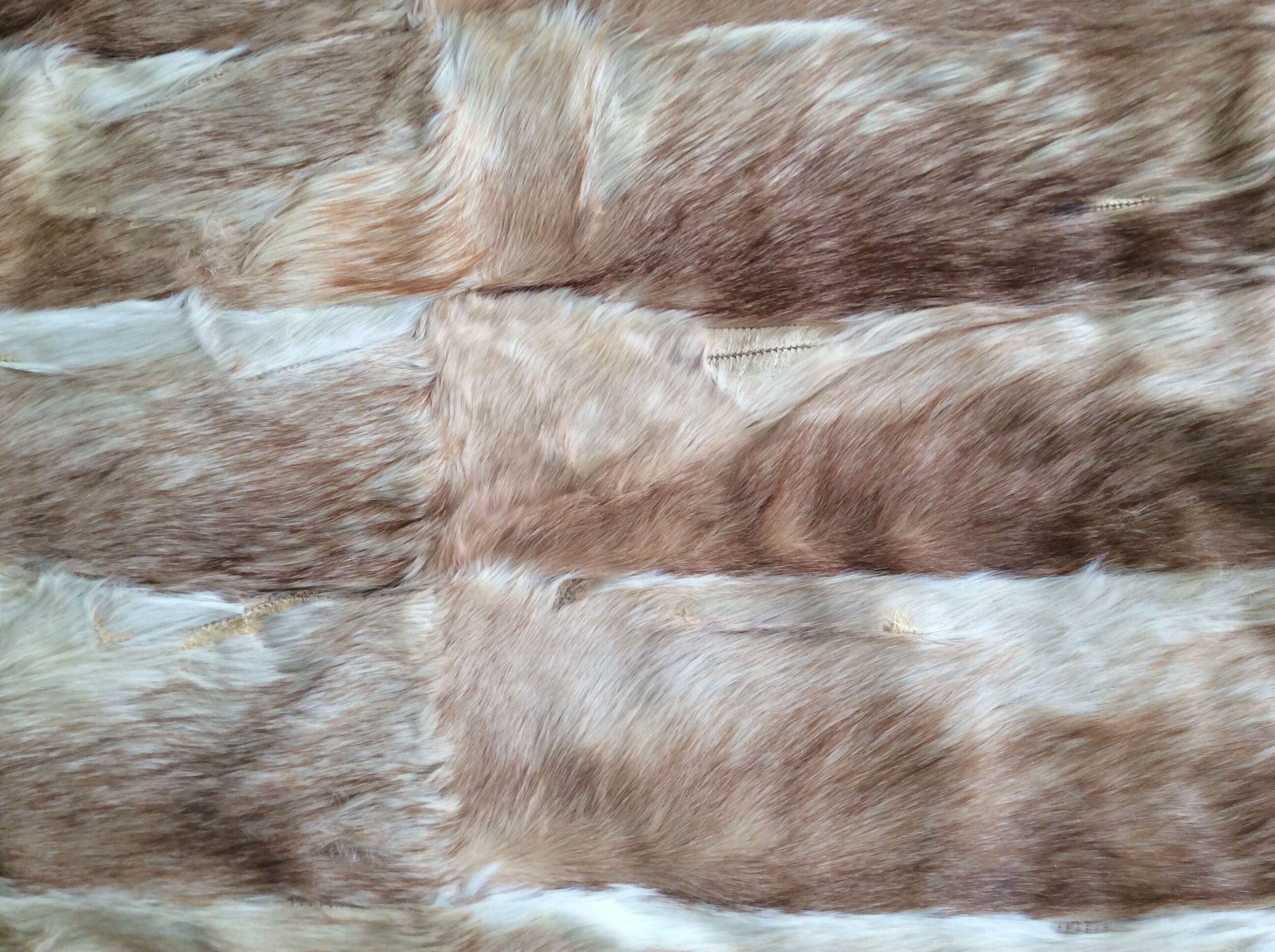 Rabbit skin rug, 200x225cm.