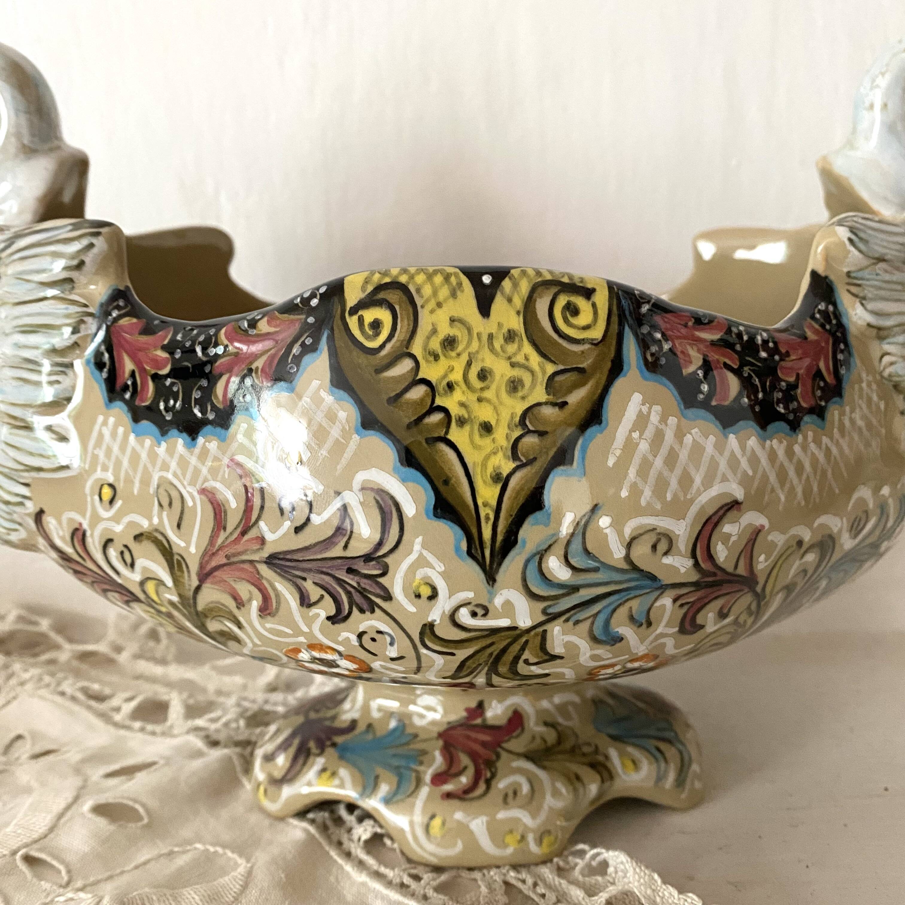Molaroni planter, Pesaro, Italy, swans