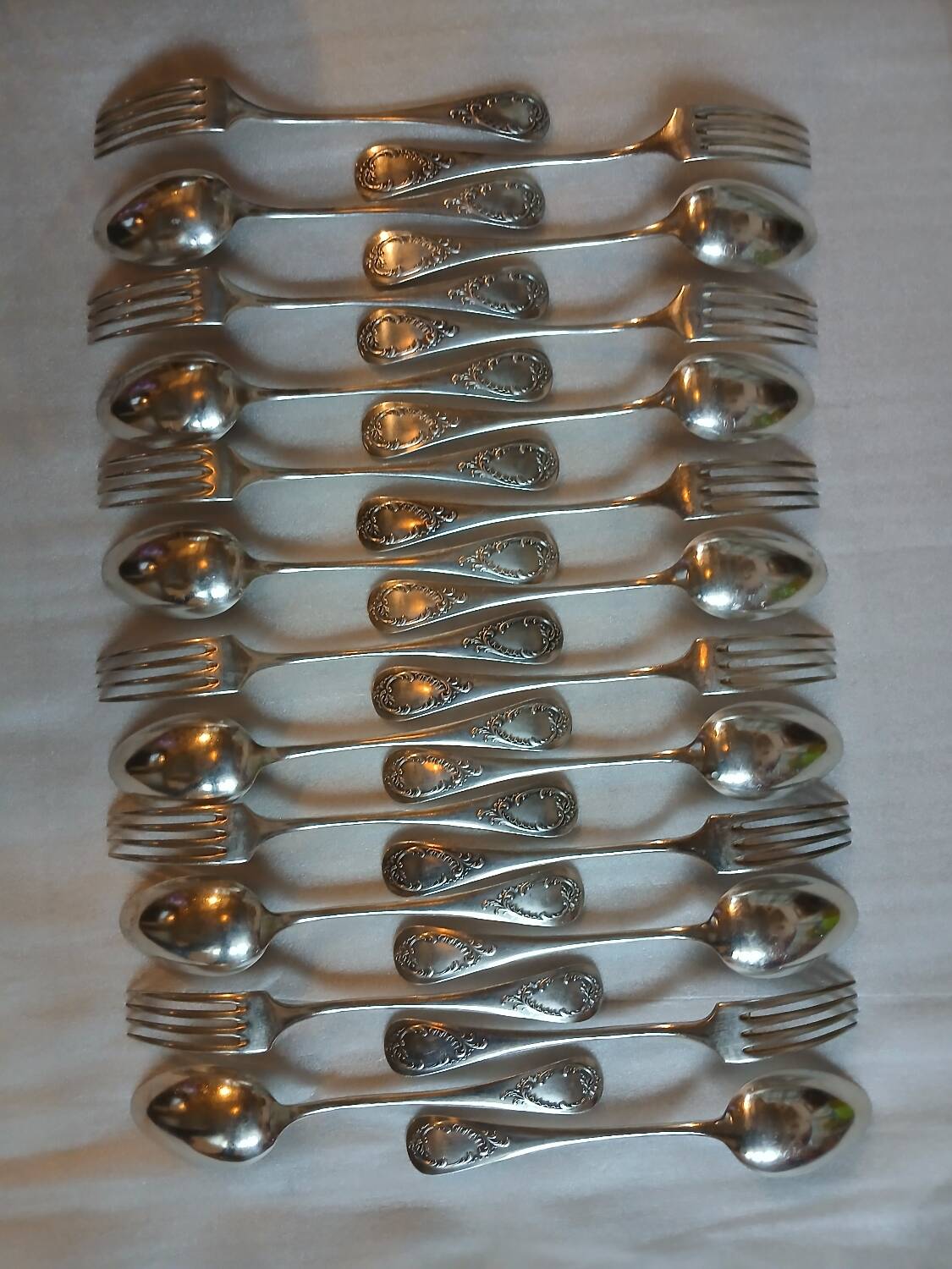 24 antique silver-plated cutlery sets