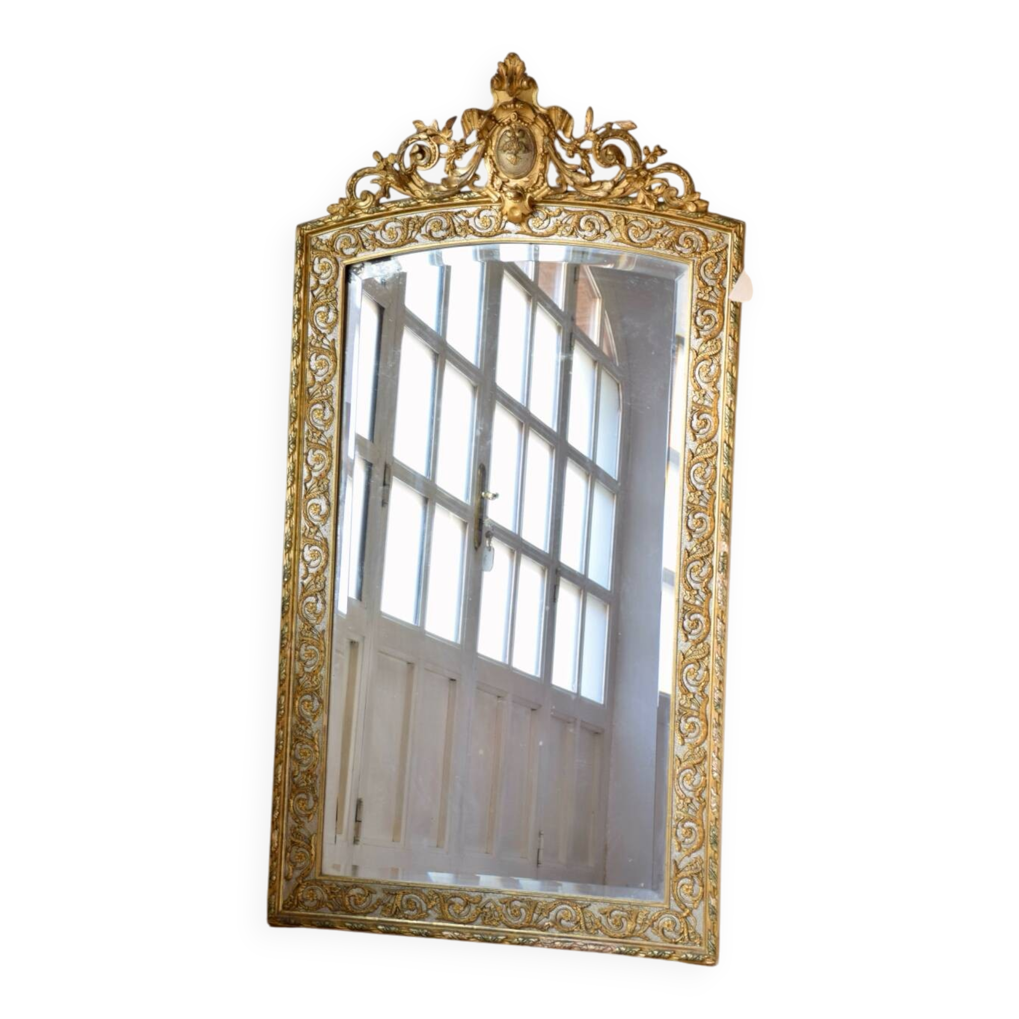 Large antique gilded mirror in the Baroque style