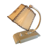 Brass bedside lamp and beige lampshade art deco style