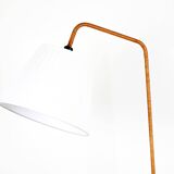 Floor lamp with magazine rack