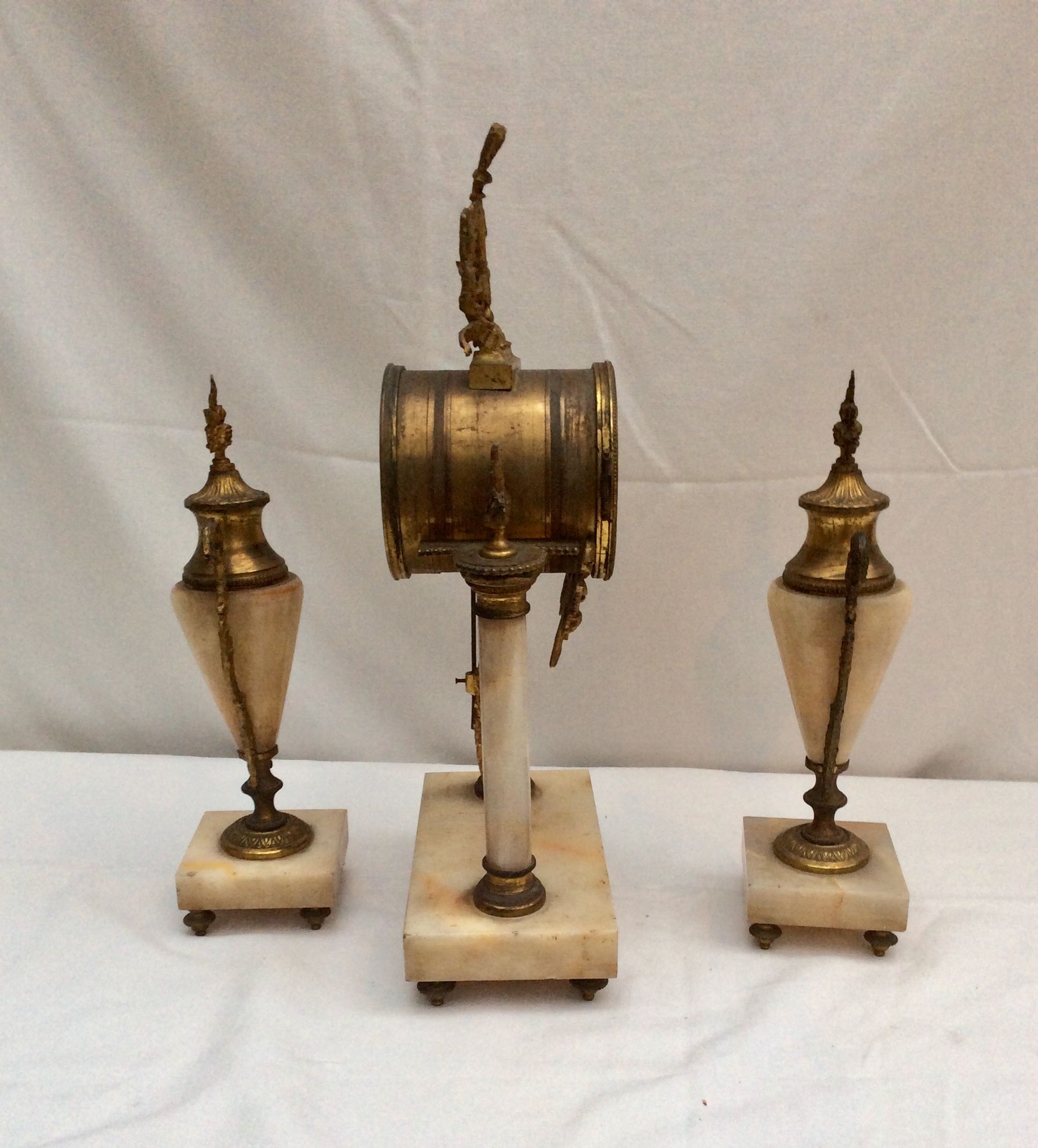 Clock fireplace trim and two vases in onyx and bronze style Louis XVI