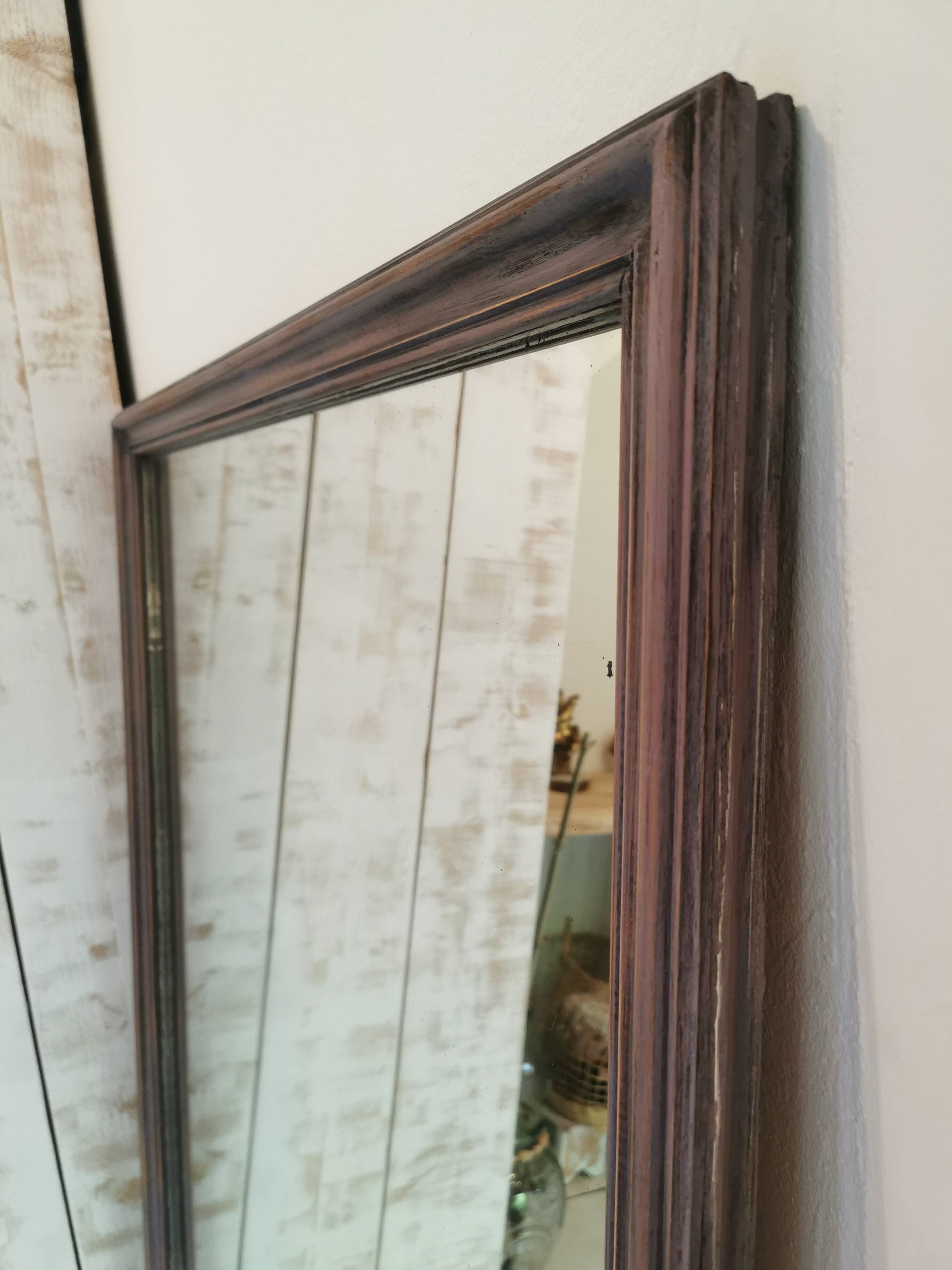 Large wooden and plaster mirror