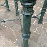 Pair of verdigris metal and glass side tables