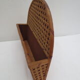 Old mail rack in wood and honey-colored rattan