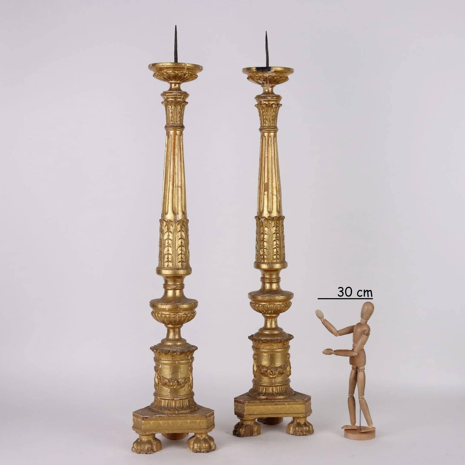 Pair of antique Empire candlesticks in wood, Europe, early 19th century.