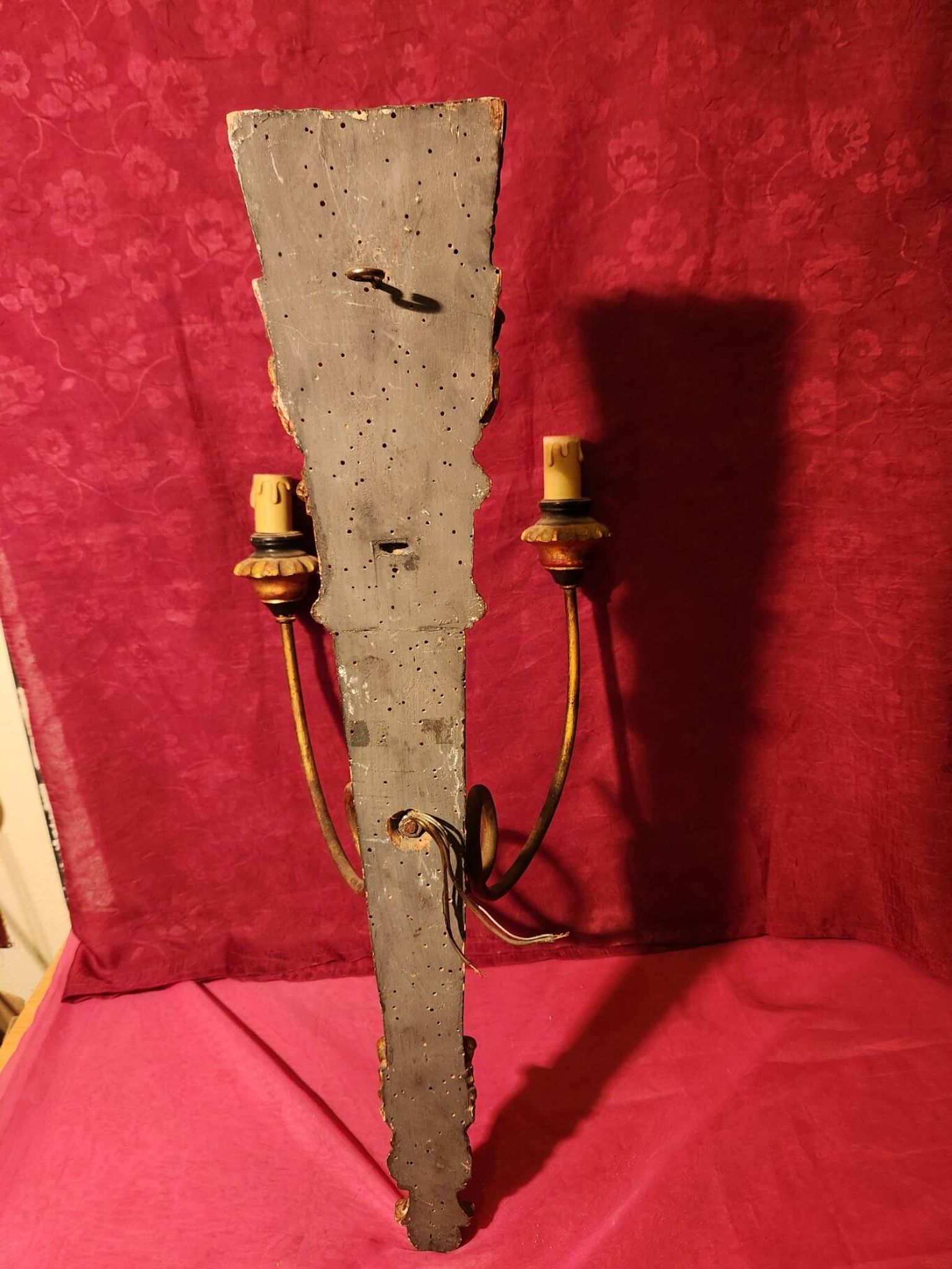 Large antique double wall light in gilded and black wood from the attic