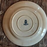 Ancient round iron earth dish
