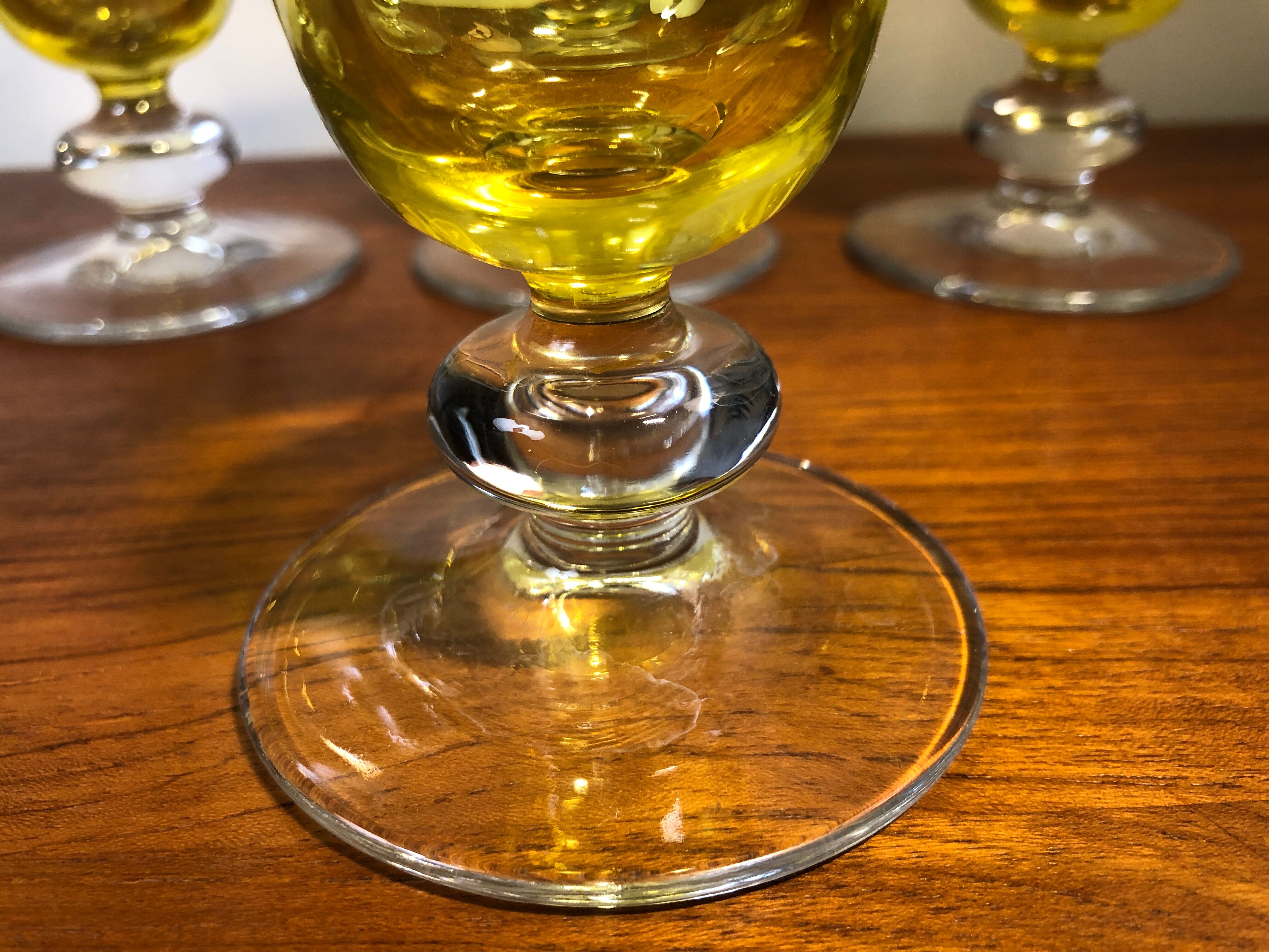Large transparent yellow champagne flutes