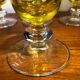Large transparent yellow champagne flutes