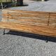 Wooden garden bench with cast iron base
