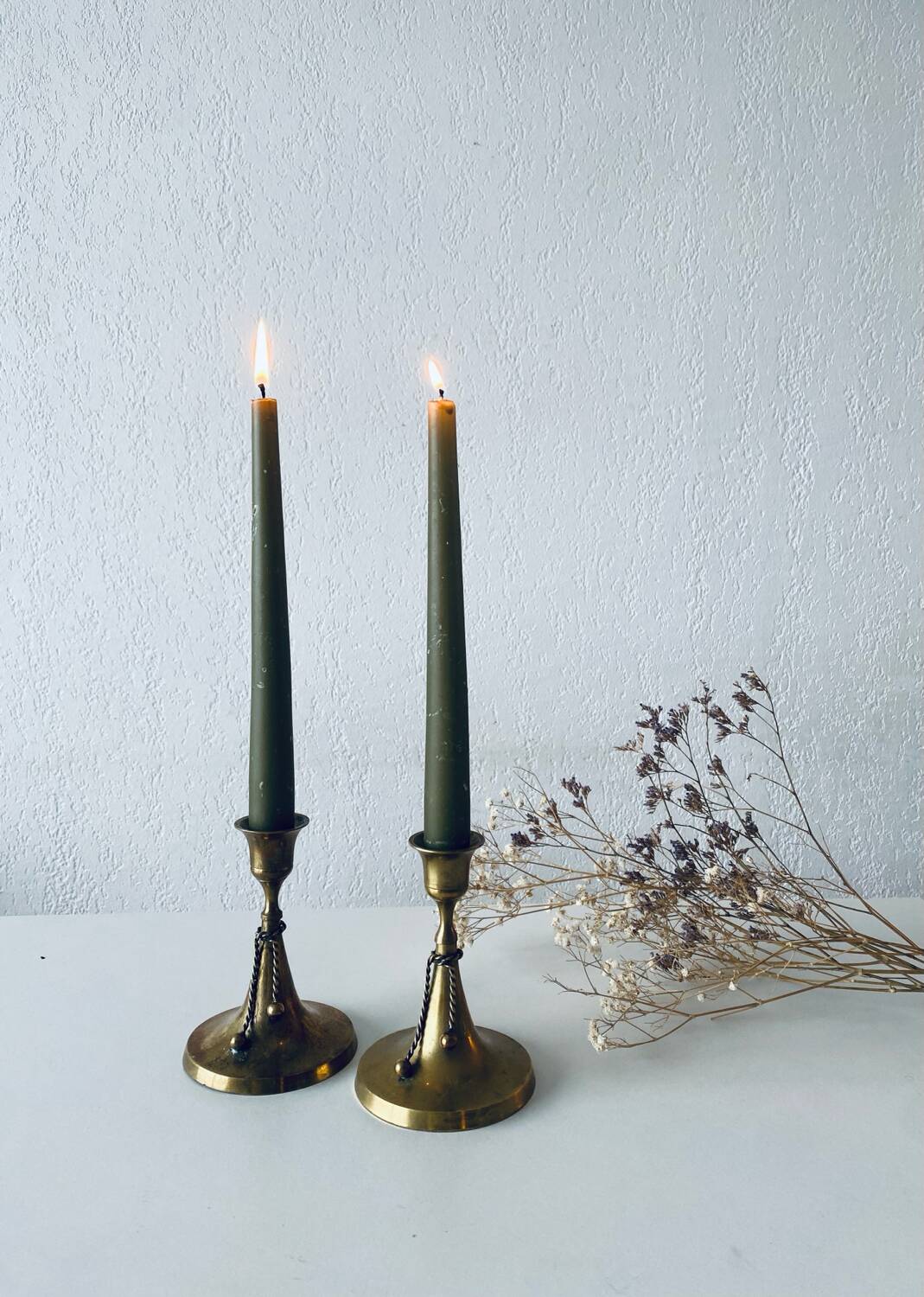 Pair of brass cord candle holders
