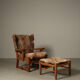 Brutalist oak lounge chair and ottoman in original goat hide, 1960s