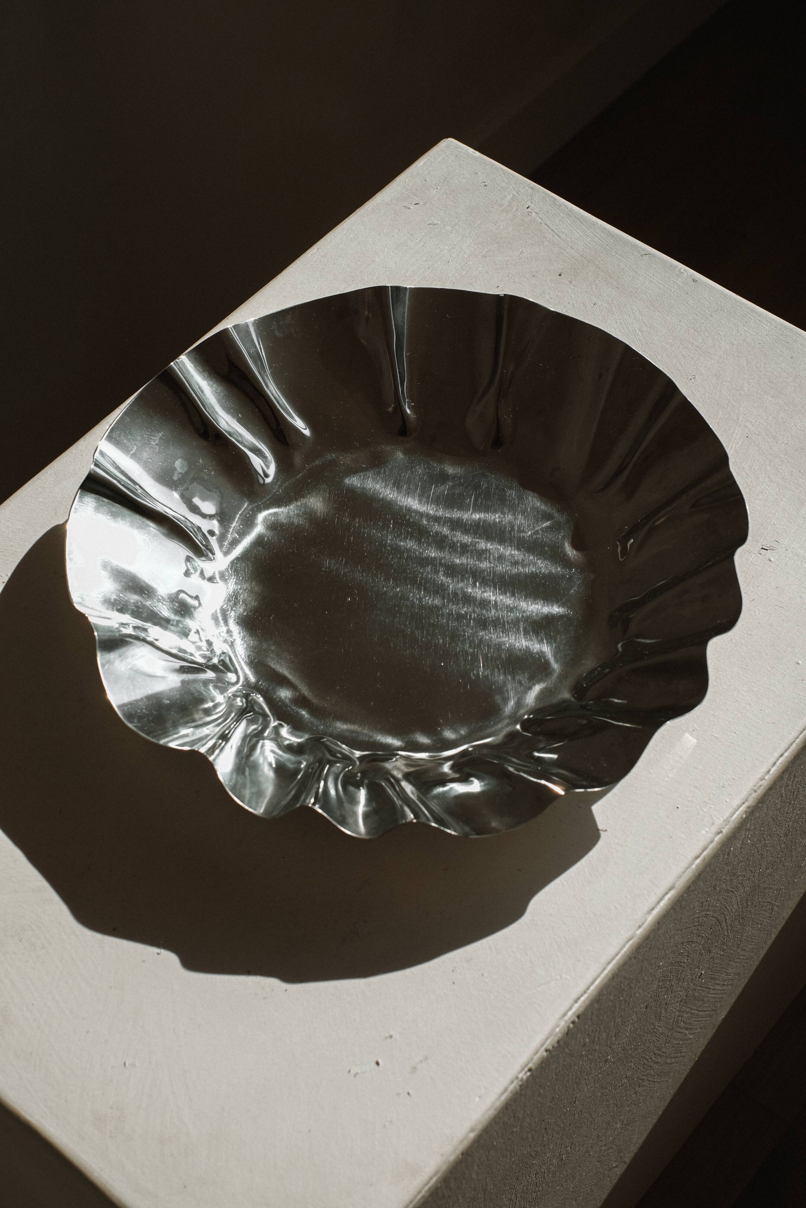 Large folded chrome bowl