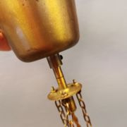 Ceiling-hanging lamp in glass with prisms and metal details