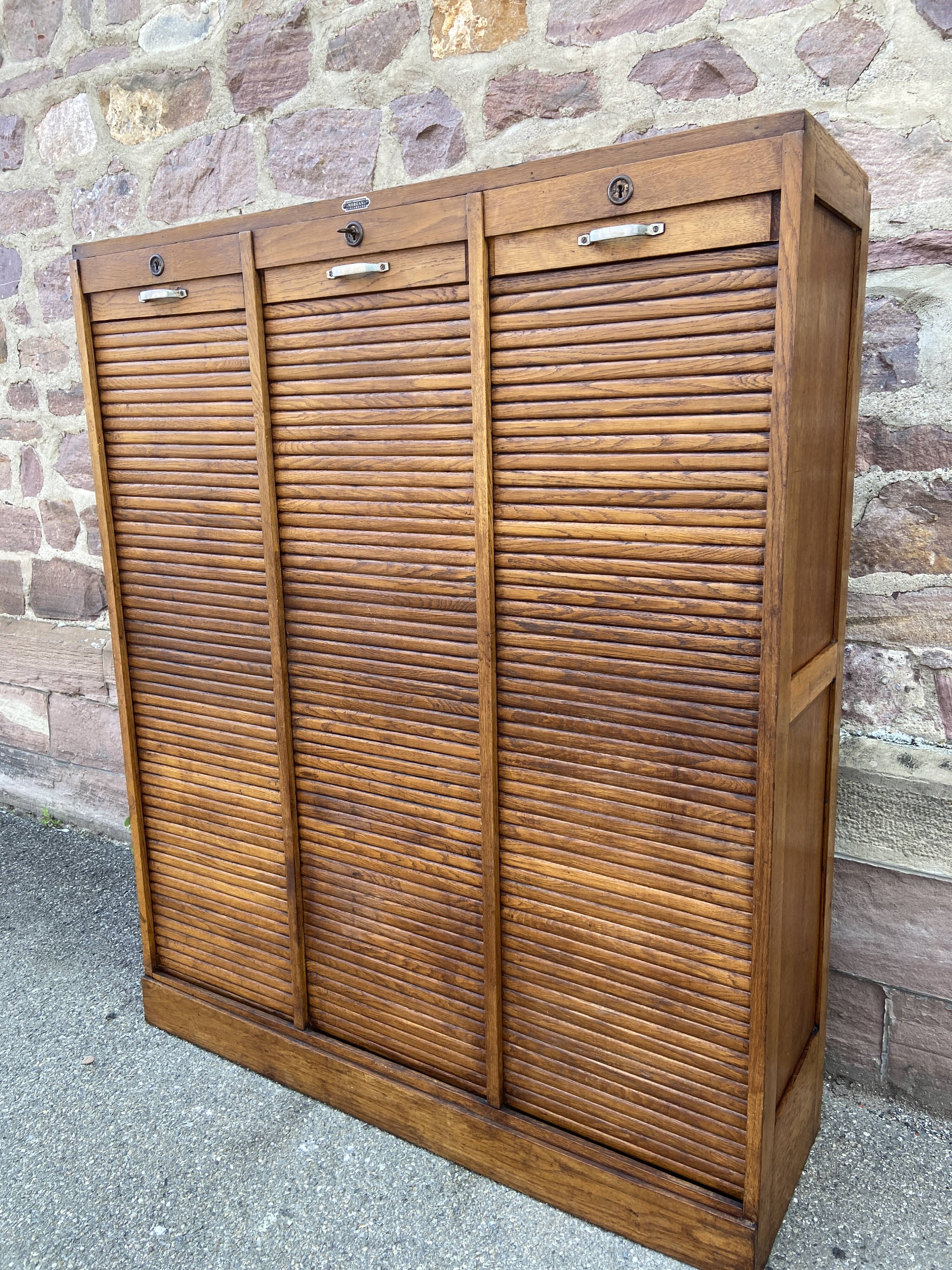 Vintage sliding curtain binder cabinet