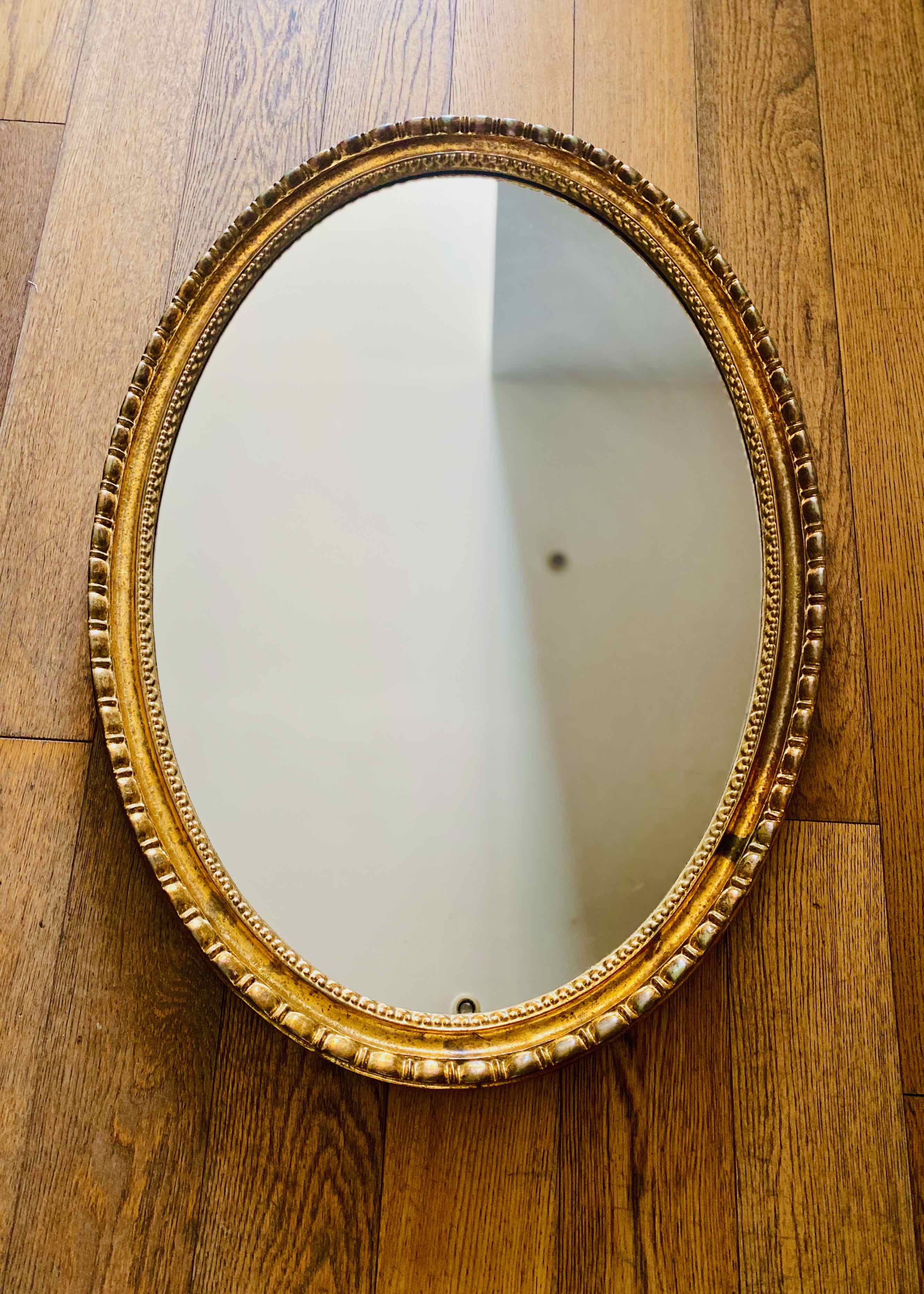 Miroir ovale doré, années 50/60