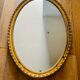 Miroir ovale doré, années 50/60