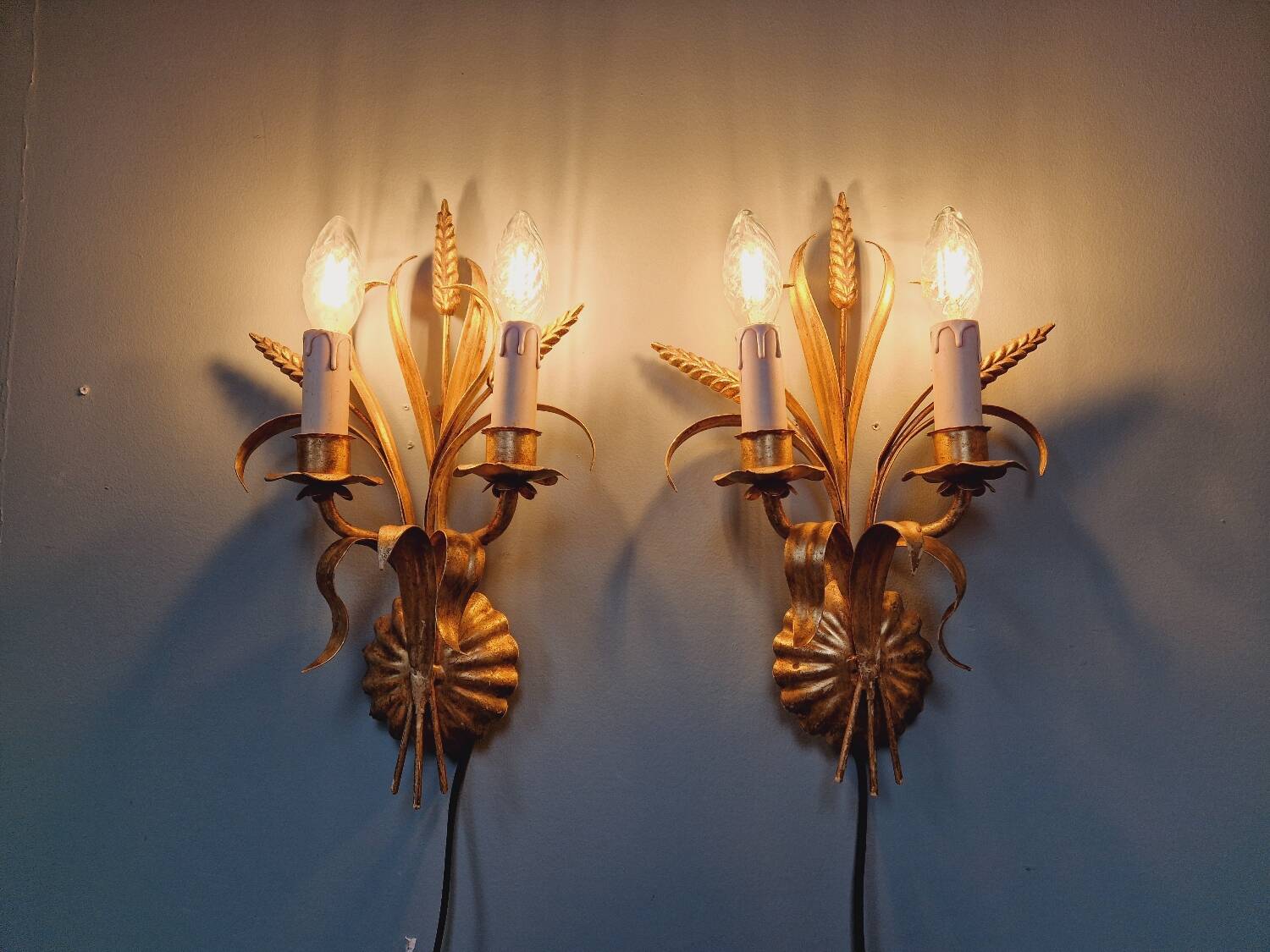 Pair of Italian wall sconces in gilded metal