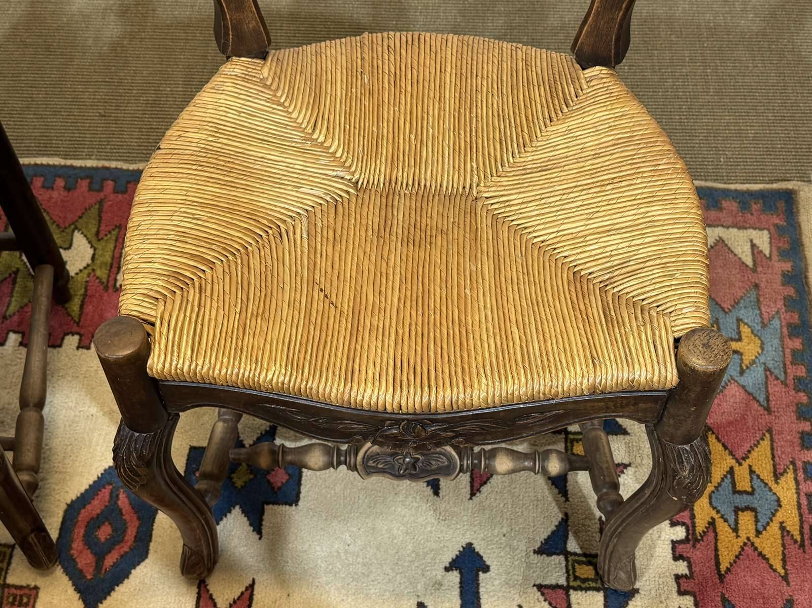 Set of 7 Louis XV style beech chairs with straw seats.