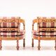 Pair of Giorgetti "1975 Gallery" armchairs in carved wood, original upholstery.
