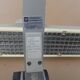 WALDMANN articulated workshop lamp with two industrial clamp arms for architects.
